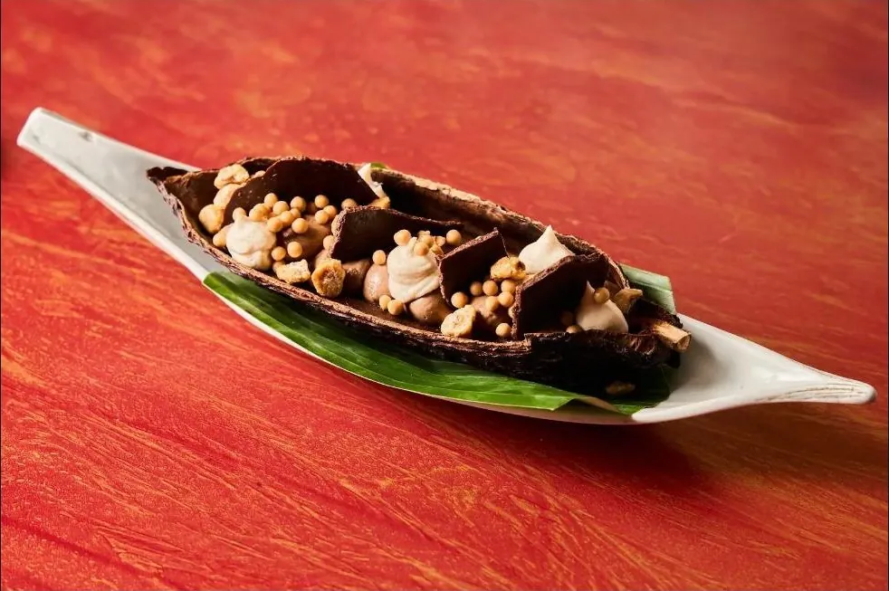 Dish served on a leaf-shaped plate at IKIBORN